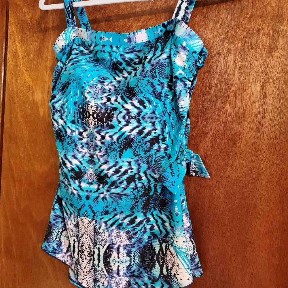 One piece swimsuit with sarong.